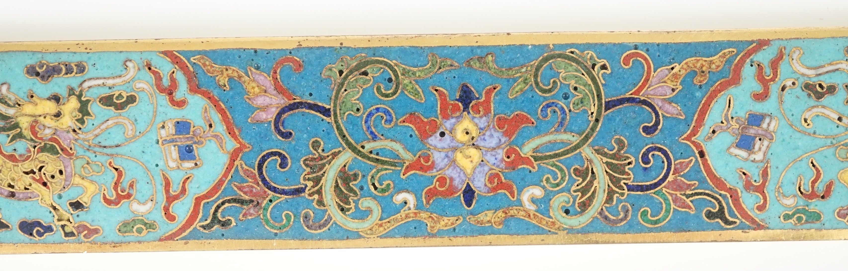 A Chinese cloisonné enamel and gilt bronze scroll weight, 24.8cm long